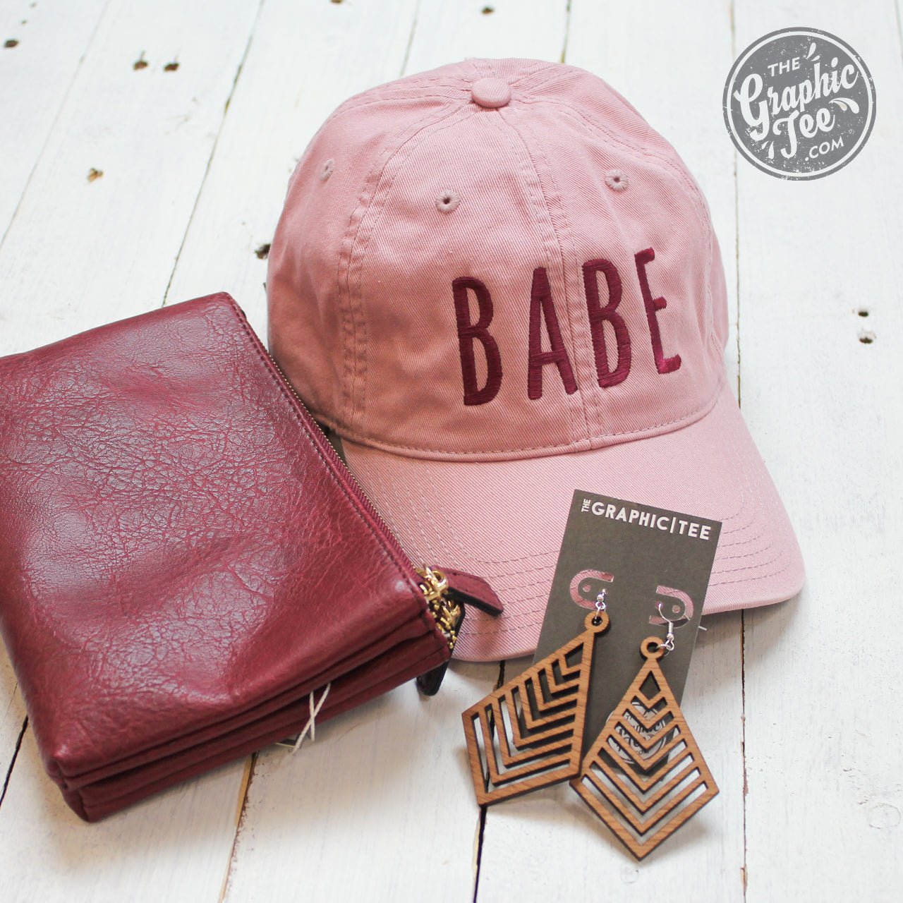 Dusty rose relaxed twill dad hat by Babe, featuring a casual cap style with a comfortable fit and adjustable strap.