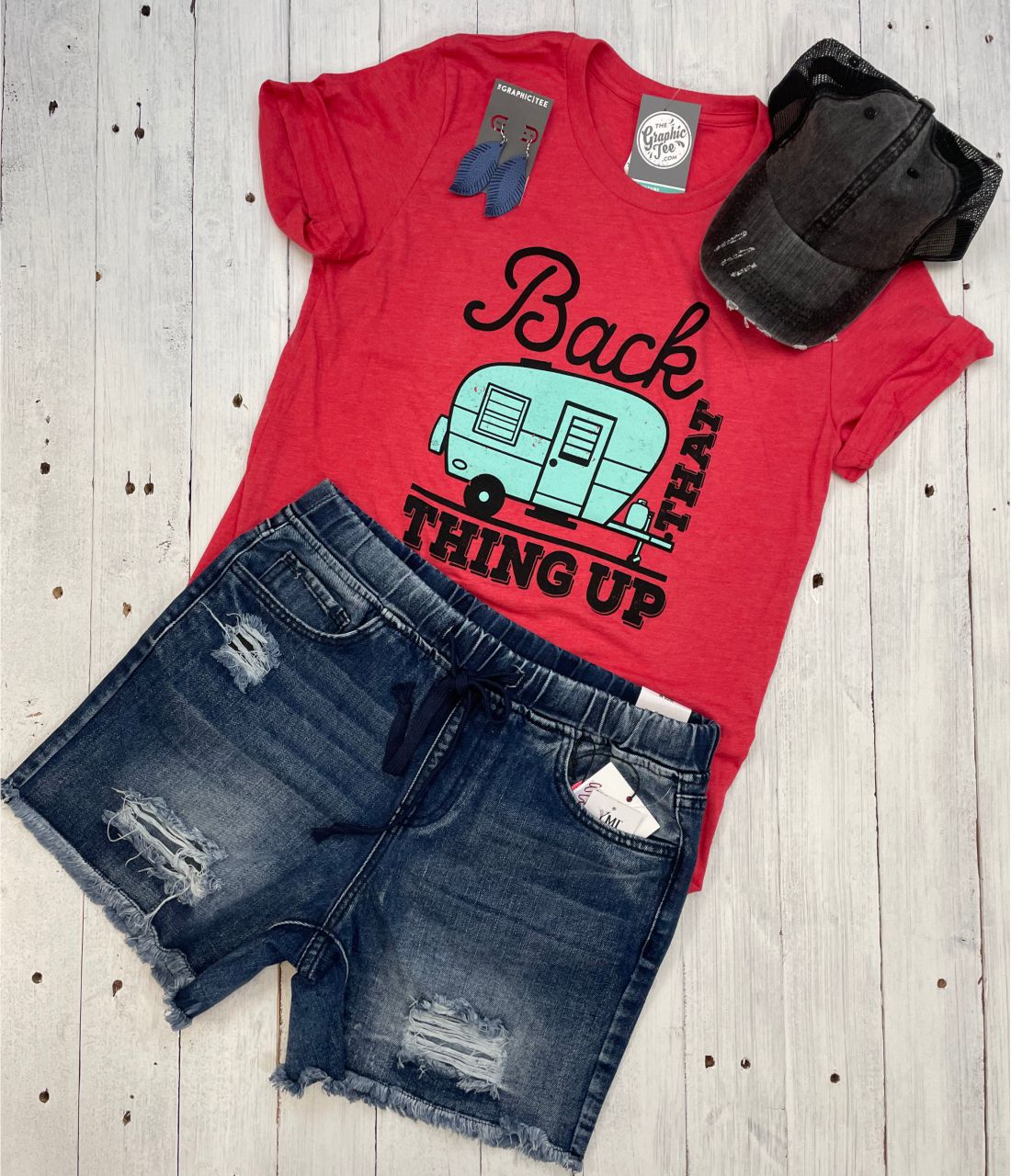 Unisex graphic t-shirt from The Graphic Tee featuring a "Back That Thing Up" design on the front, casual streetwear style.
