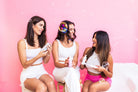 Brightening strawberry bubbles from beaut.beautyco. featuring pink, fizzy bubbles in a clear container with fresh strawberries.