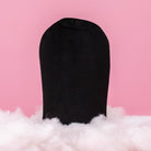 Beaut.beautyco. tanning mitt for applying self-tanner, soft fabric with a black exterior and comfortable grip.