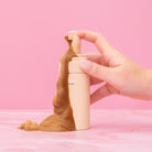 Beauty.co Toast'd Glow skincare product jar with gold accents and a sleek design, showcasing the luxurious packaging.