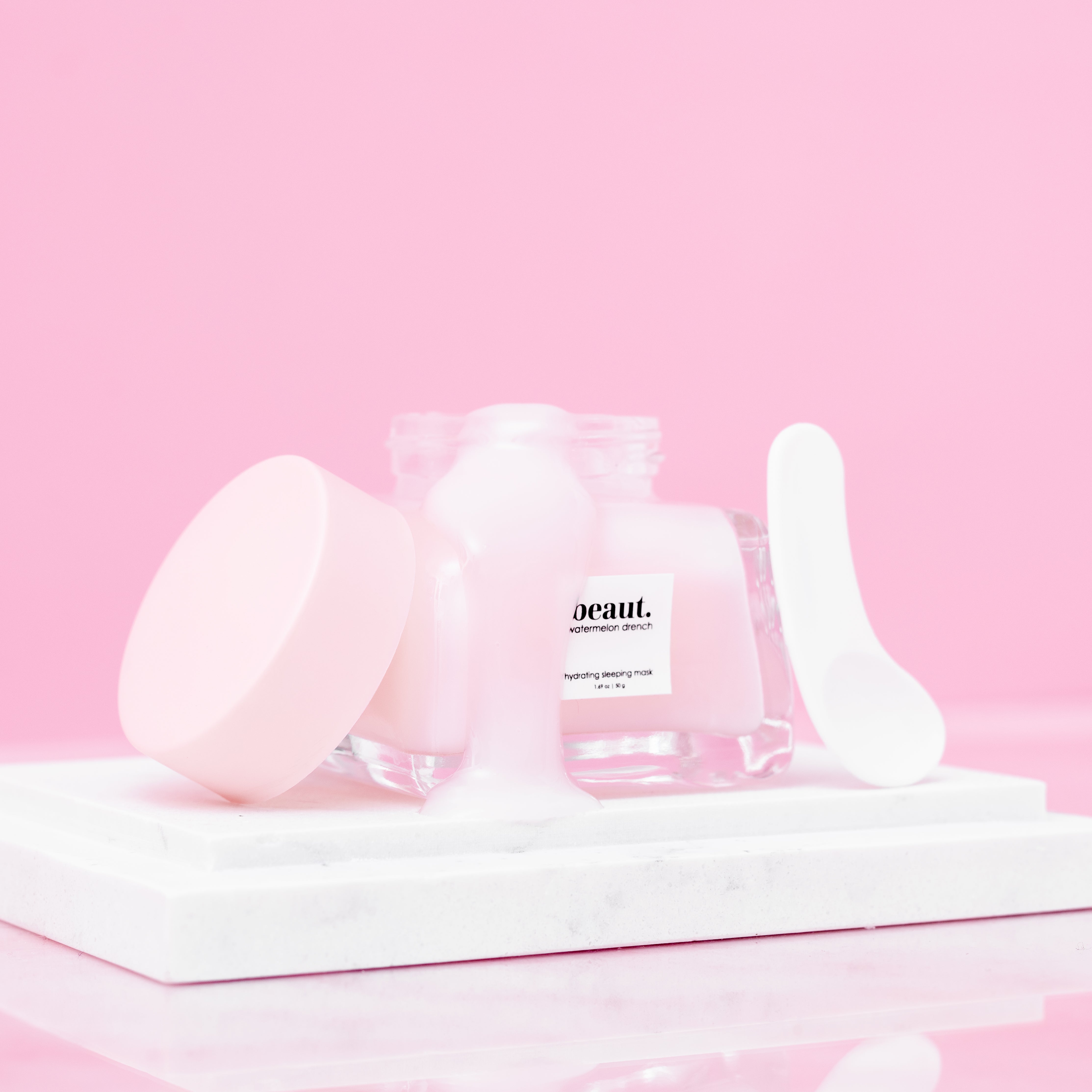 Beaut.beautyco Watermelon Drench skincare product bottle with pink and green packaging, close-up shot.