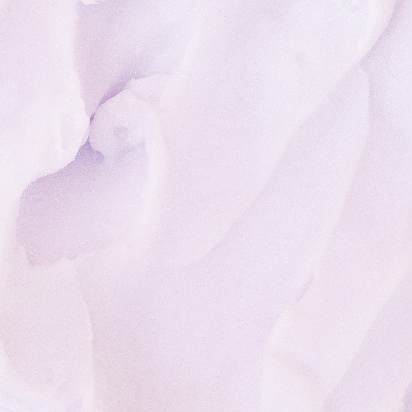 Lavender beaut. Body Drench by beaut.beautyco. features a sleek bottle with lavender-colored liquid and a natural scent.