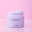 Lavender body scrub by beaut.beautyco featuring exfoliating texture and lavender scent in a jar.