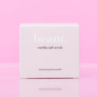 Lavender body scrub by beaut.beautyco. featuring a jar of exfoliating scrub with lavender flowers and natural ingredients.