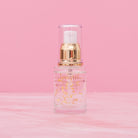 Bottle of Beaut.BeautyCo. Golden Hour 24K Gold Serum showing the sleek glass container with gold accents.