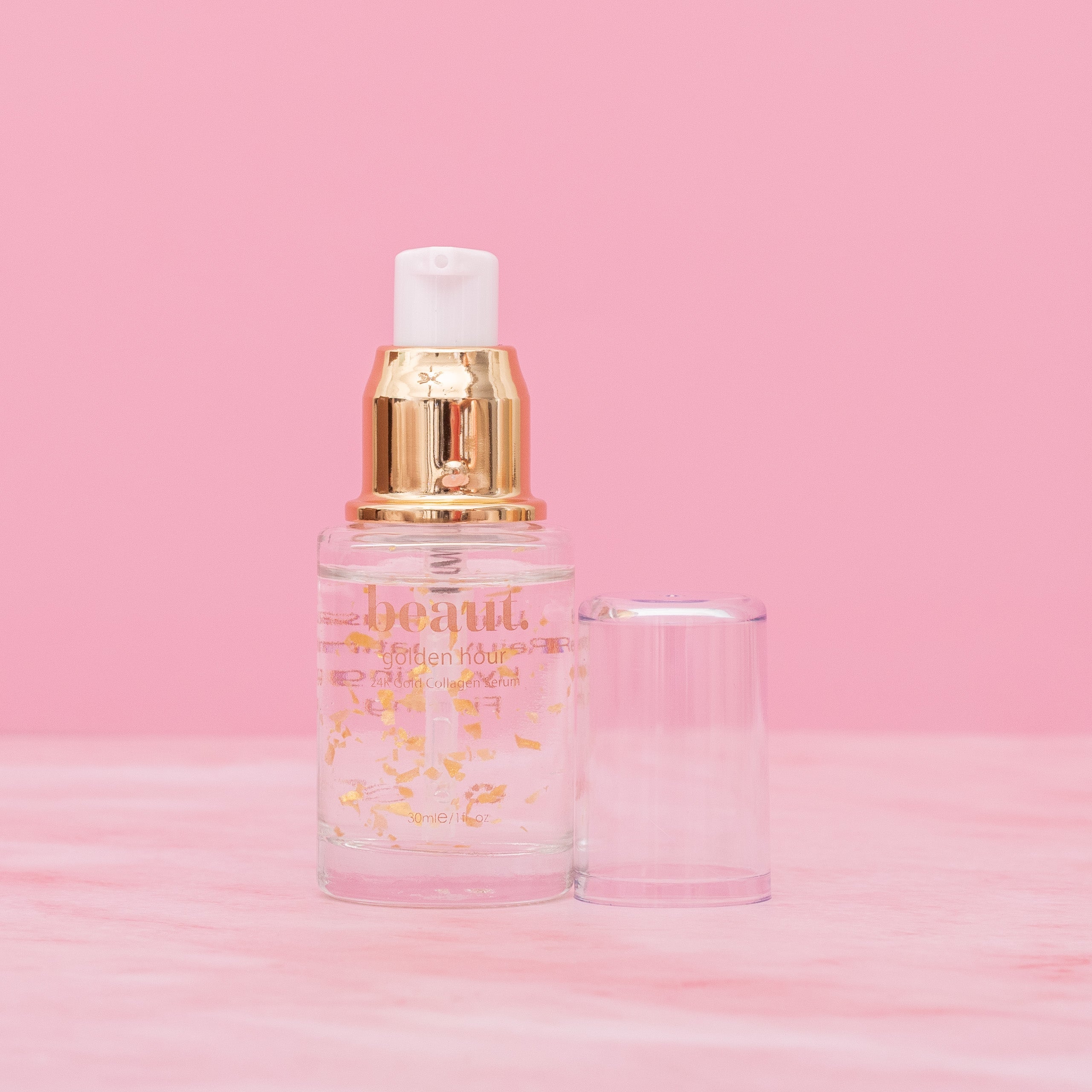 Beauty.beautyco. Golden Hour 24K Gold Serum bottle showcasing luxurious gold-colored packaging and elegant branding.