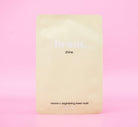 Beaut.beautyco. Shine sheet mask lying flat, showing the sleek packaging and bright design for glowing skin.
