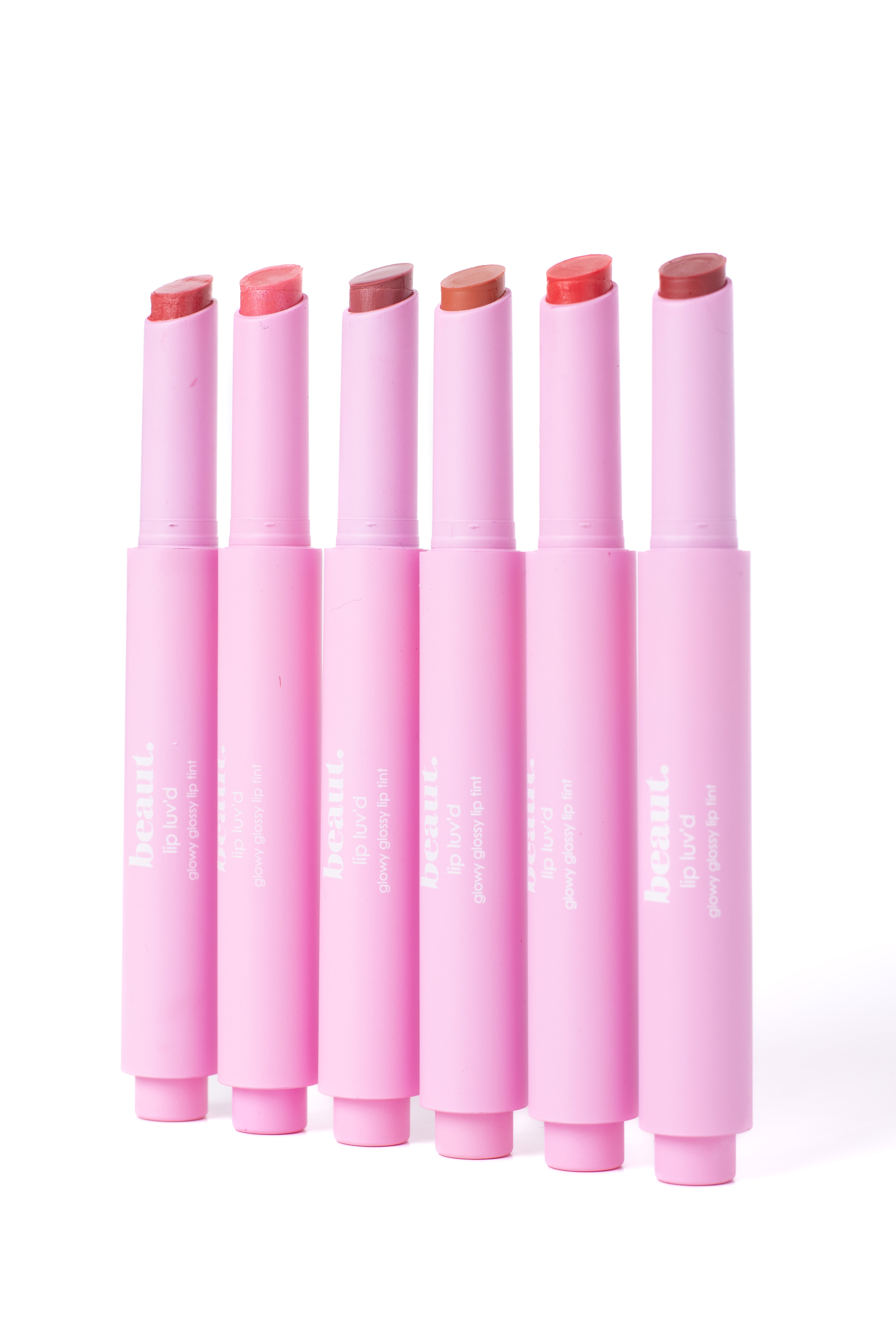 Beaut.beautyco. Lip Luv’d in Sunkiss D featuring a close-up of the lipstick tube and swatched lip color.