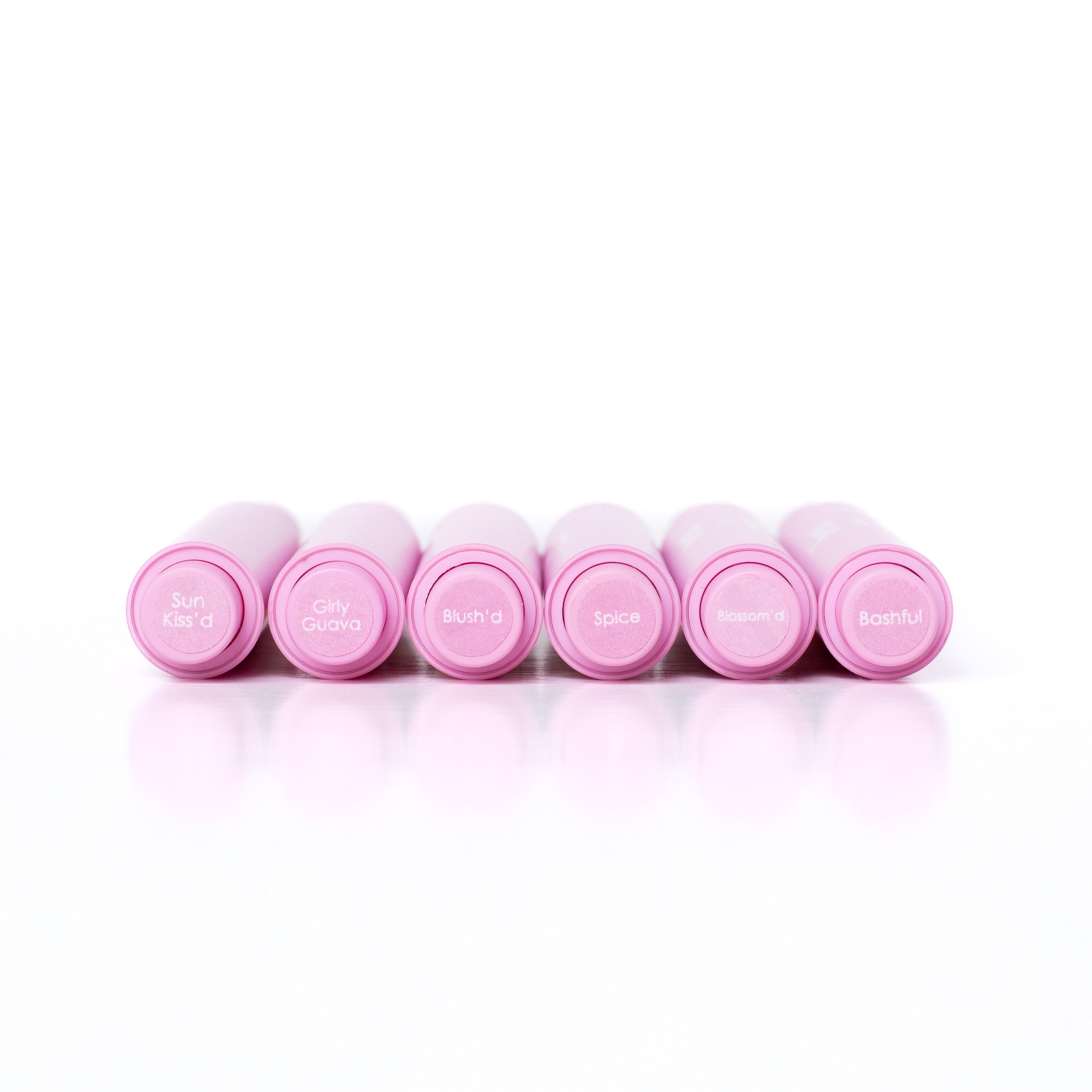 Sunkiss Lip Luv’d by beaut.beautyco. featuring a close-up of the lip gloss tube with a shiny, peach-toned lip gloss applicator inside