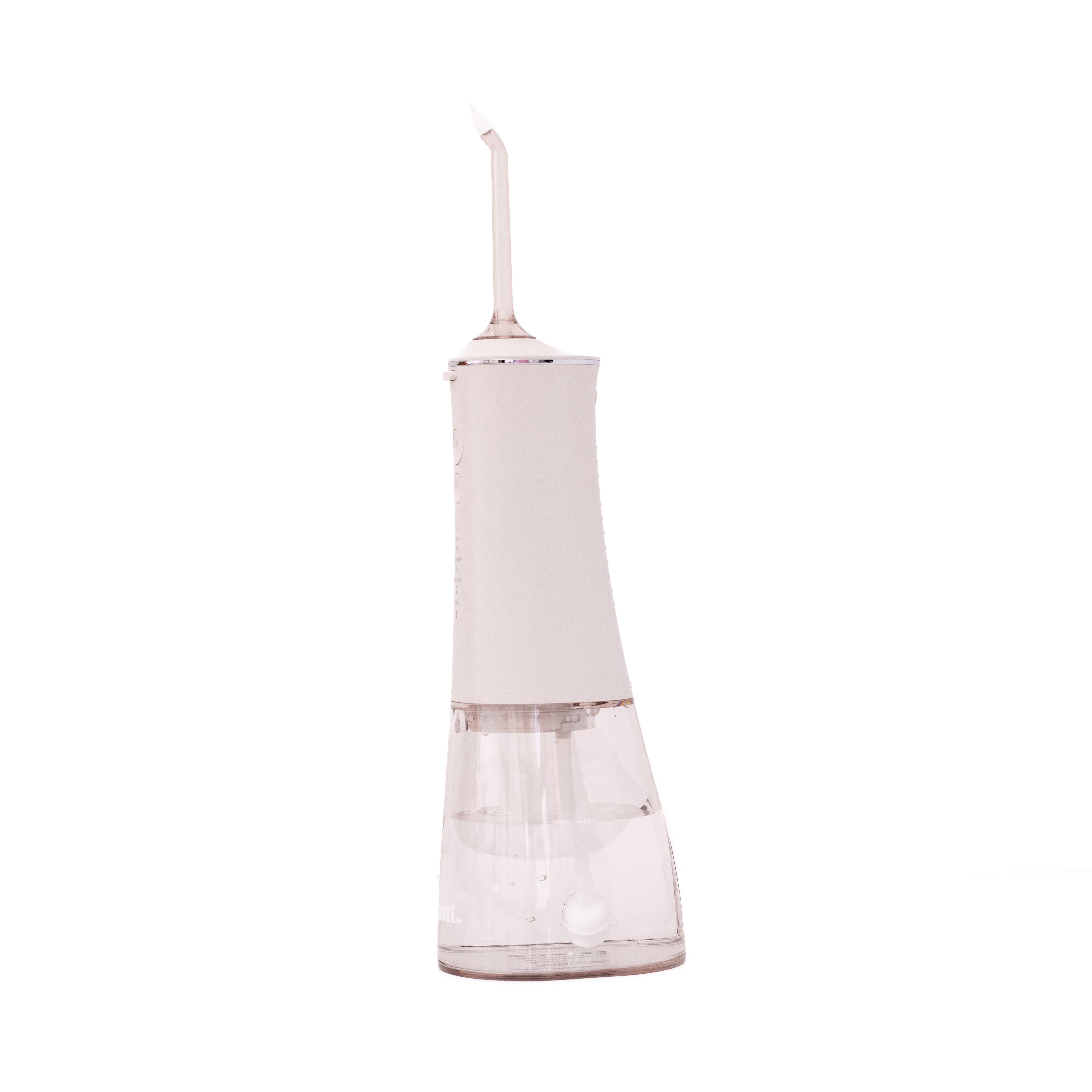 White H2O Hydroflossé from beaut.beautyco., a water flossing device with sleek design and ergonomic handle.