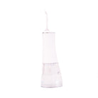White H2O Hydroflossé by beaut.beautyco. featuring a sleek, modern design with the device and attached water flosser tip.
