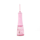 White H2O Hydroflossé dental water flosser by beaut.beautyco. with adjustable water pressure and ergonomic design.
