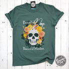 The Graphic Tee pigment dyed short sleeve graphic tee featuring the "Beautiful Day. Beautiful Mindset" design on soft fabric.
