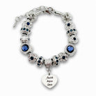 Bella's Yard Faith Hope Love bracelet featuring silver charms and beaded design on a delicate chain.
