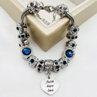 Bella's Yard Faith Hope Love Bracelet with engraved charms on a delicate chain, showcasing inspirational jewelry design.