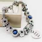 Bella's Yard Faith Hope Love bracelet featuring engraved charms on a delicate chain, symbolizing faith, hope, and love.