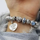 Close-up of Bella's Yard Piece Of My Heart bracelet featuring a delicate chain and heart-shaped charm on a neutral background.