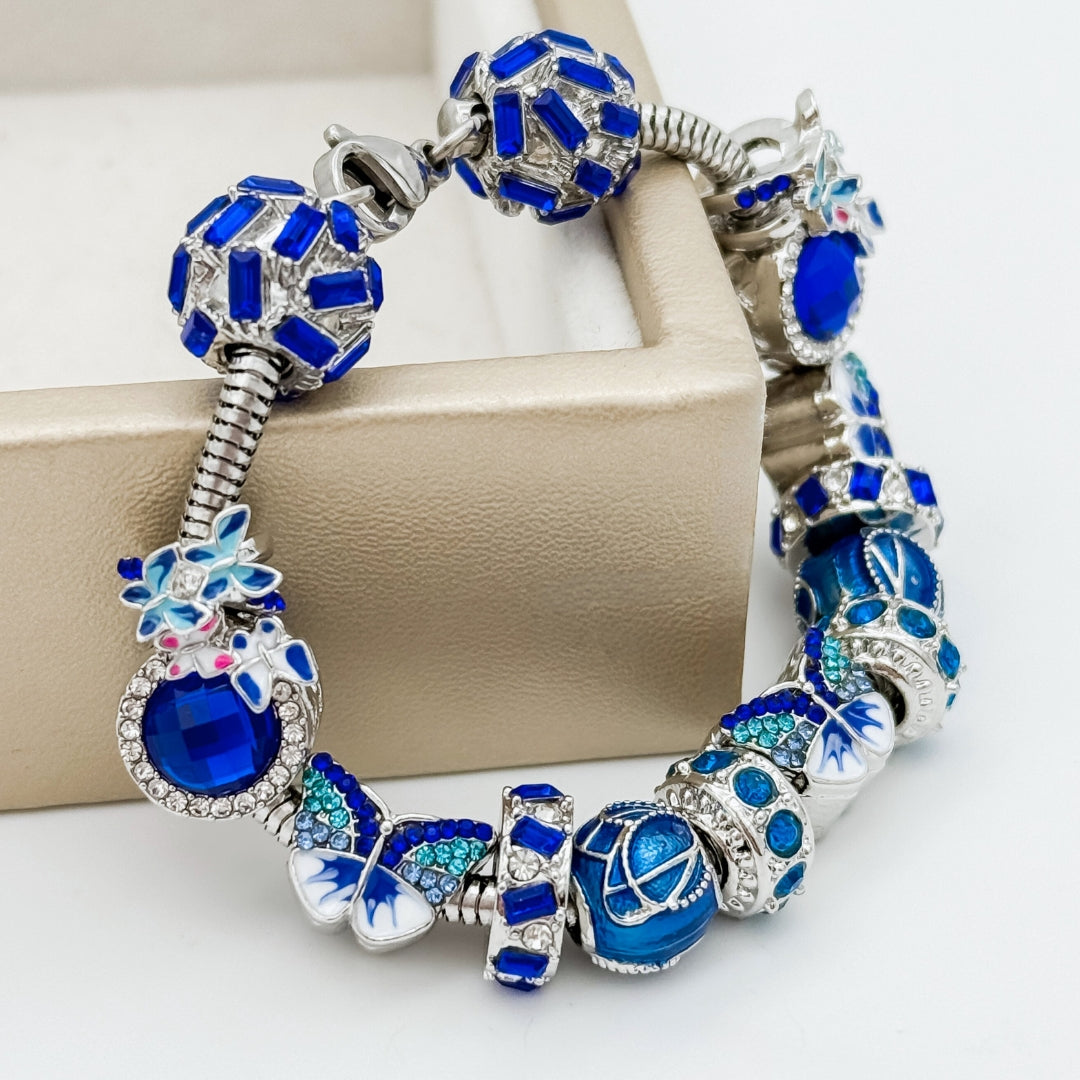 Bella's Yard Enchanted Flight Butterfly bracelet with delicate butterfly charms and adjustable chain for elegant wear.