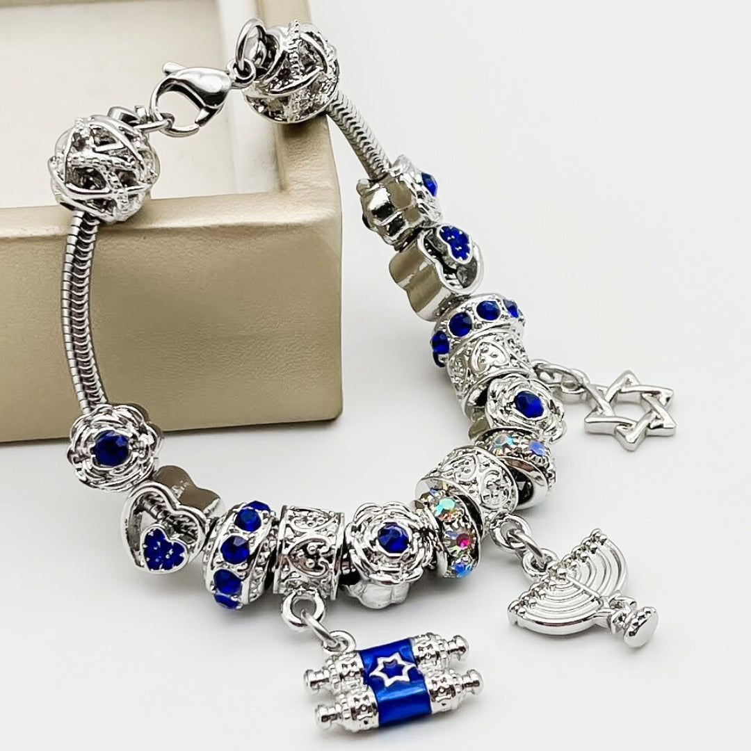 Bella's Yard Love & Light bracelet featuring delicate beads and a charm, perfect for layered jewelry styles.