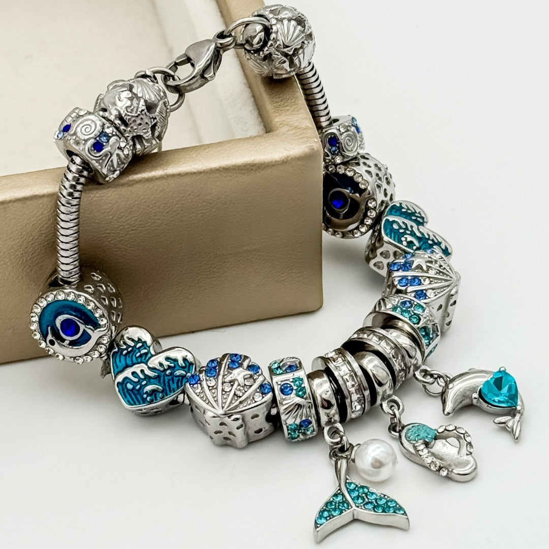 Colorful Ocean Dreams bracelet by Bella's Yard featuring beaded design with ocean-inspired blue and green hues.