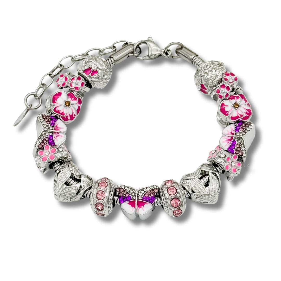 Elegant butterfly bracelet by Bella's Yard featuring delicate petal-inspired charms on a silver chain.