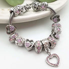 Elegant birthstone bracelet from Bella's Yard featuring colorful gemstones on a delicate chain for personalized jewelry.