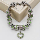 Elegant birthstone bracelet from Bella's Yard featuring colorful gemstones on a delicate chain.