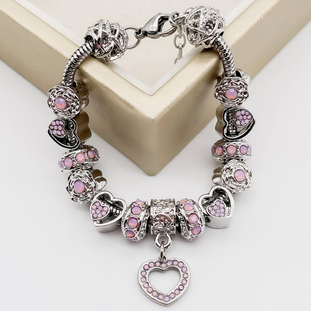 Colorful birthstone bracelets from Bella's Yard showcasing various gemstones on delicate bracelet chains.
