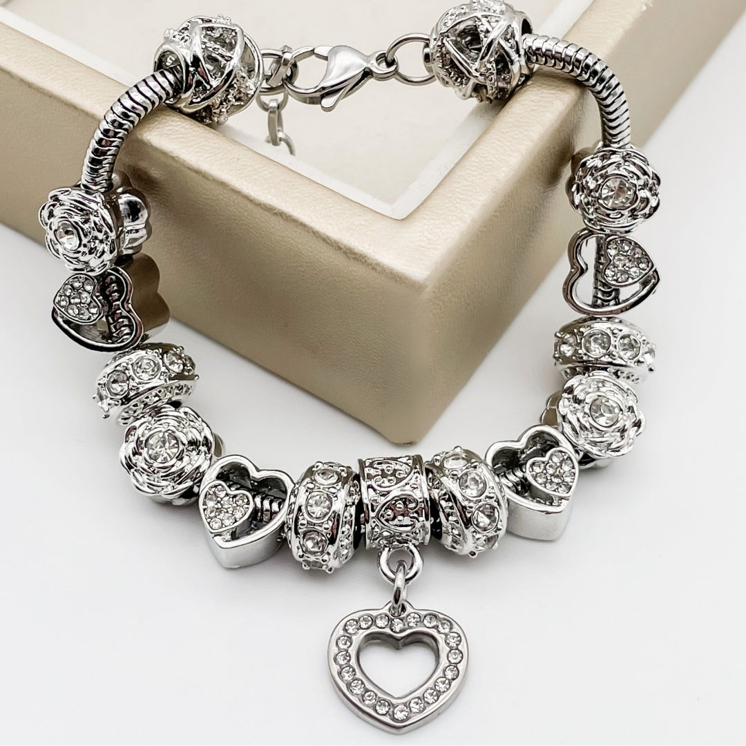 Colorful birthstone bracelets by Bella's Yard featuring vibrant gemstones and delicate chain designs.