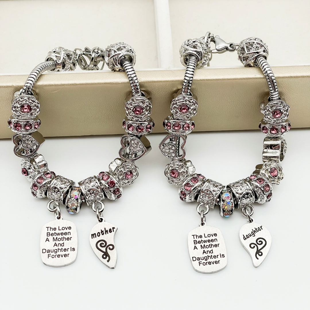Elegant mother and daughter eternal love bracelets by Bella's Yard featuring intertwined heart charms and delicate chain designs.
