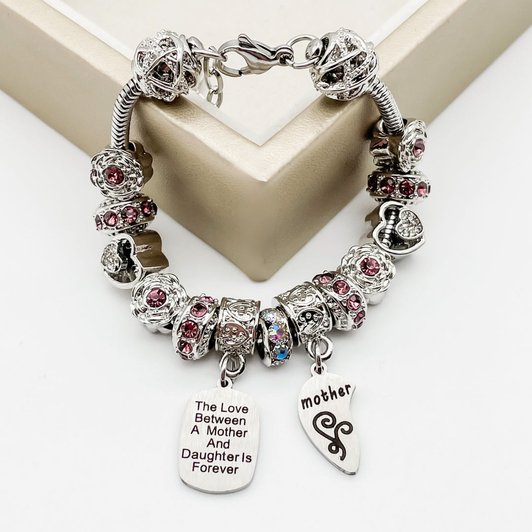 Elegant Mother Daughter Eternal Love Bracelets by Bella's Yard featuring intertwined heart charms and delicate chain links.