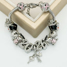 Bella's Yard You Did It Graduation bracelet with charms, featuring a silver-tone design perfect for celebrating achievements.
