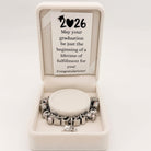 Bella's Yard You Did It Graduation Bracelet featuring a silver band and engraved graduation message for 2026.