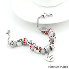 Platinum-plated "I Love You" bracelet by Bella's Yard with delicate chain and engraved charm on a white background.