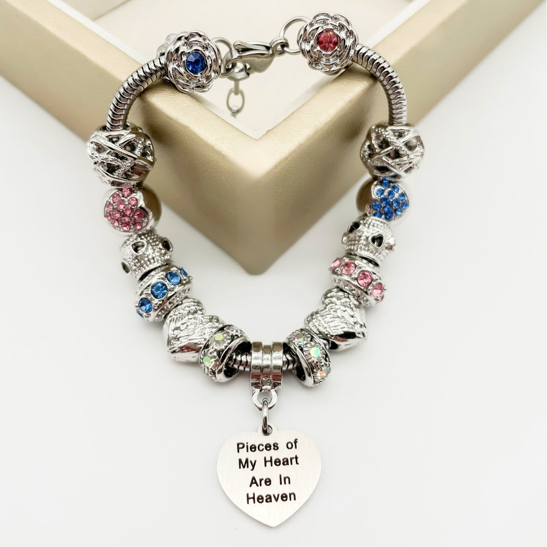 Multicolor bracelet from Bella's Yard featuring heart-shaped charms and vibrant beads, perfect for casual or layered wrist styling.