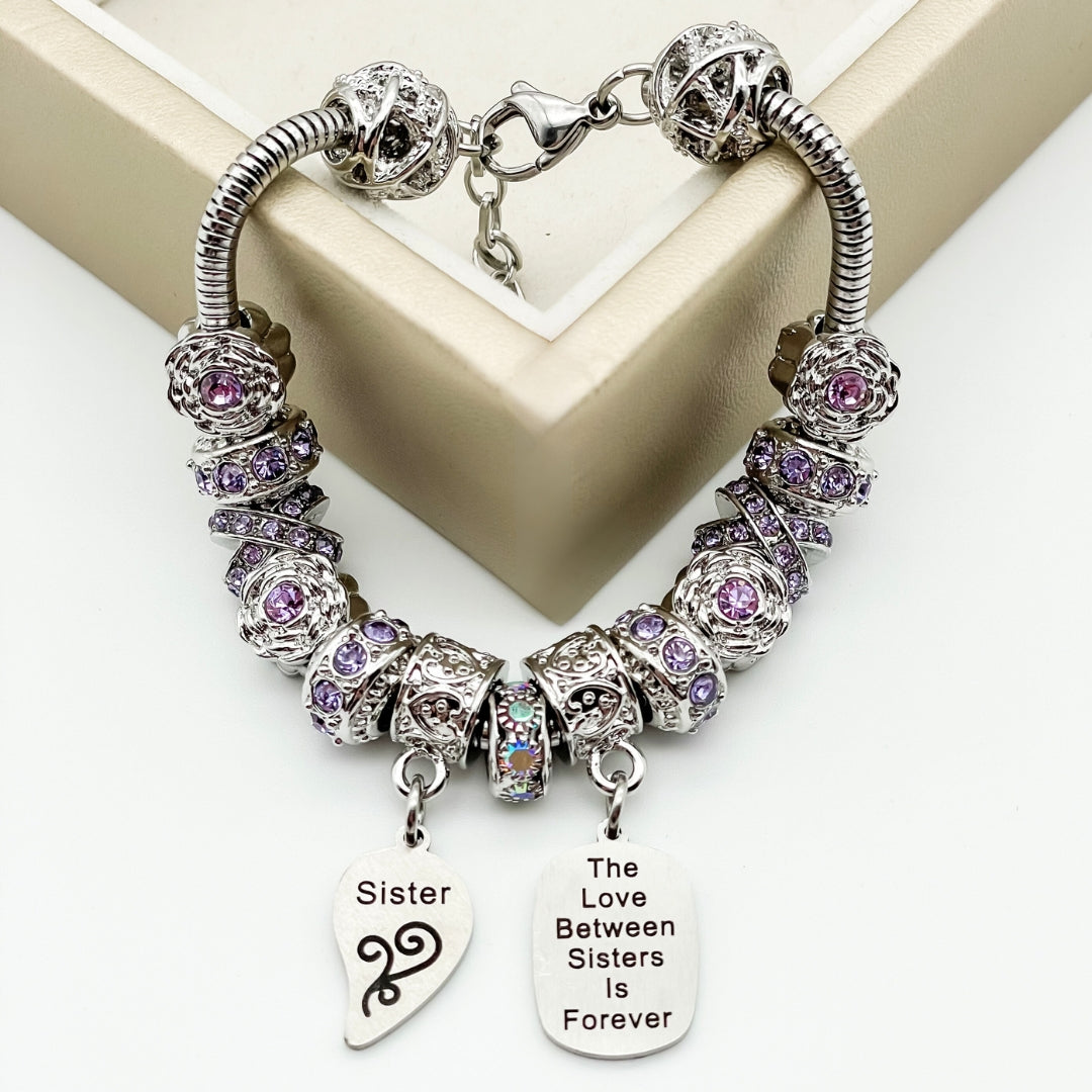 Bella's Yard Sisters Infinite Love Bracelets featuring intertwined silver-tone designs on a delicate chain.