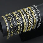 Elegant mixed metal link bracelet from Bestbeads & Beyond featuring geometric sparkle design in a chain style.