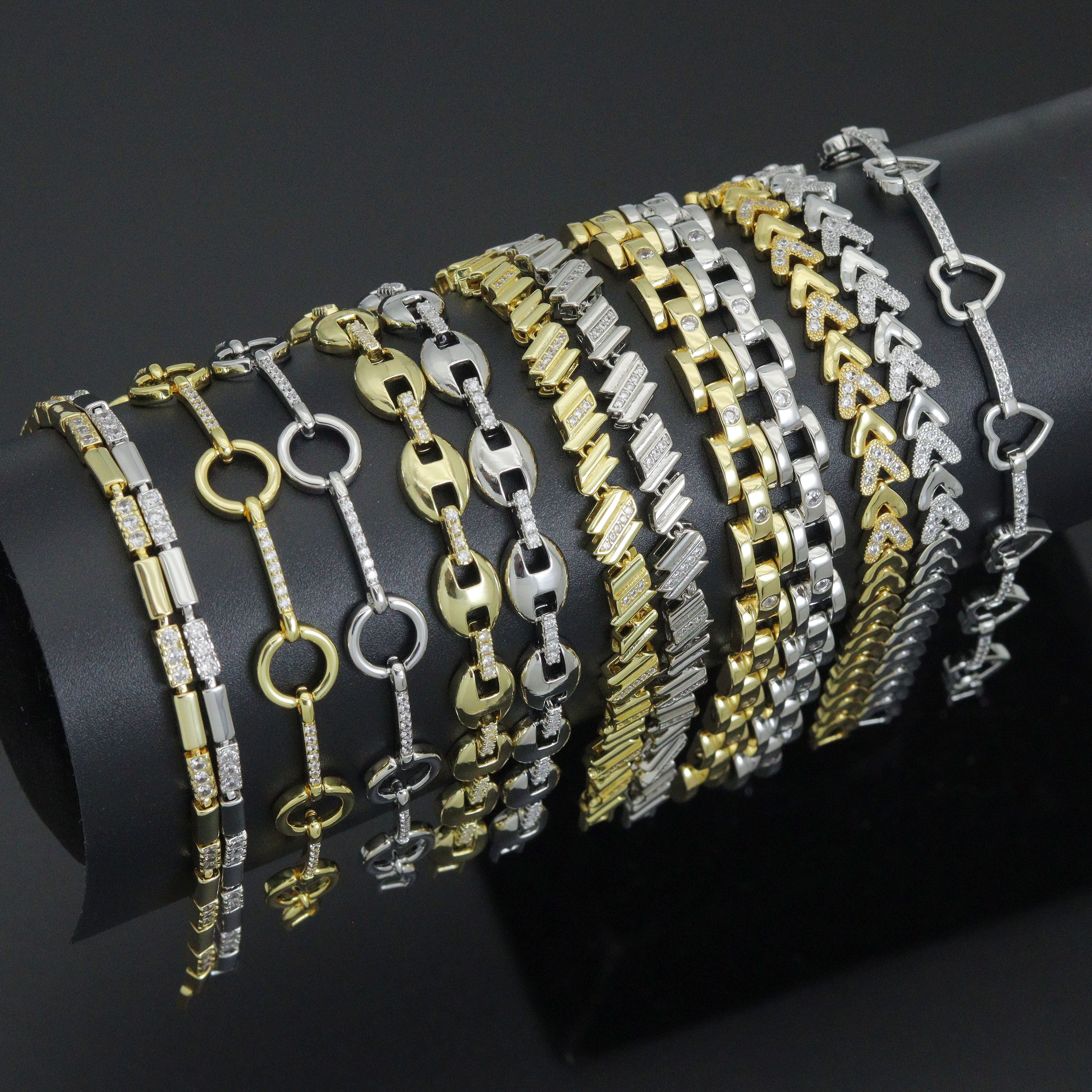 Elegant mixed metal link bracelet from Bestbeads & Beyond featuring geometric sparkle design in a chain style.