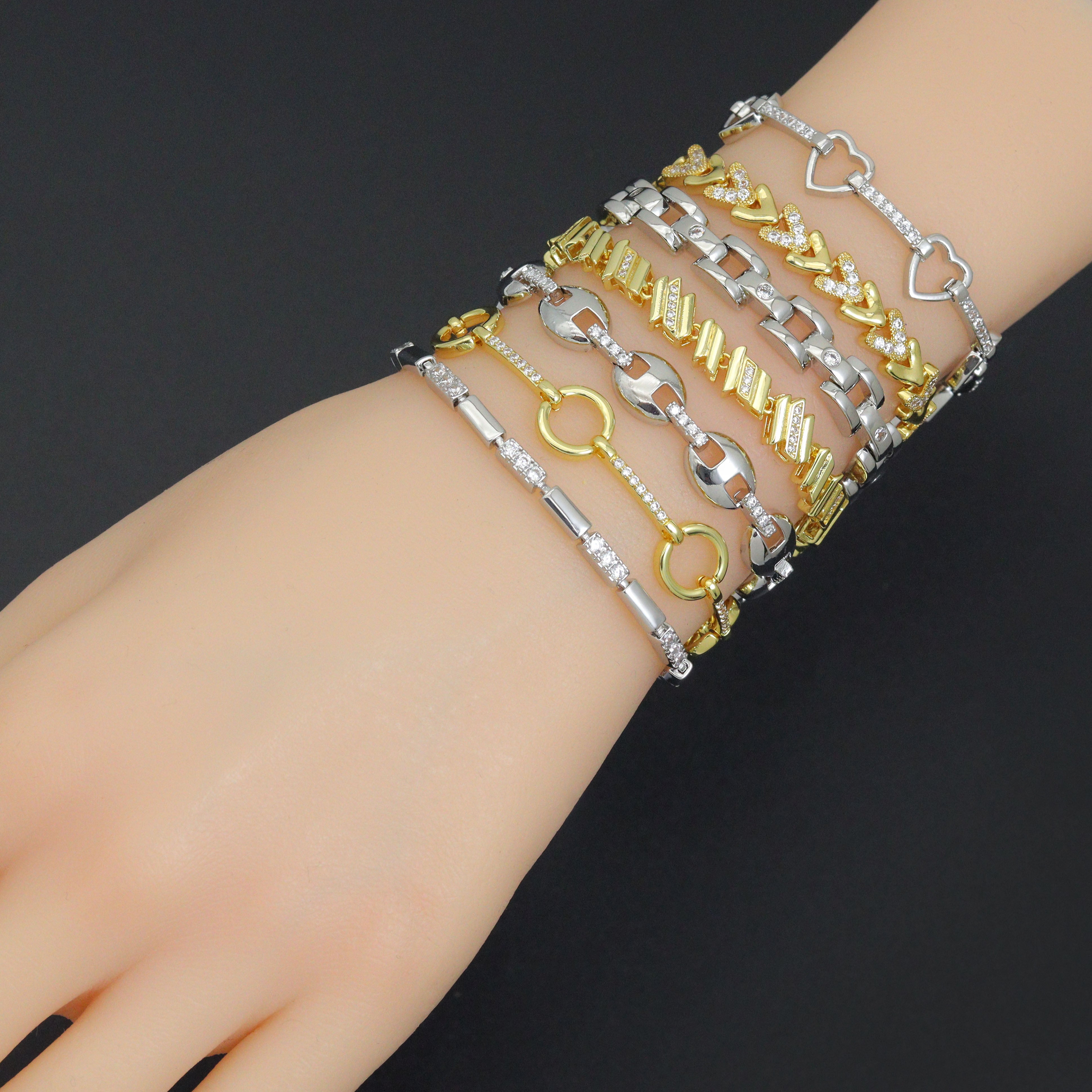 Elegant mixed metal link bracelet from Bestbeads&Beyond featuring geometric sparkle design in a chain style.