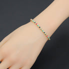7-inch rainbow hematite stretchy bracelet by Bestbeads&Beyond featuring colorful, smooth hematite beads on a flexible band.