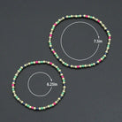 7-inch rainbow hematite stretchy bracelet by Bestbeads&Beyond with colorful hematite beads on an elastic band.
