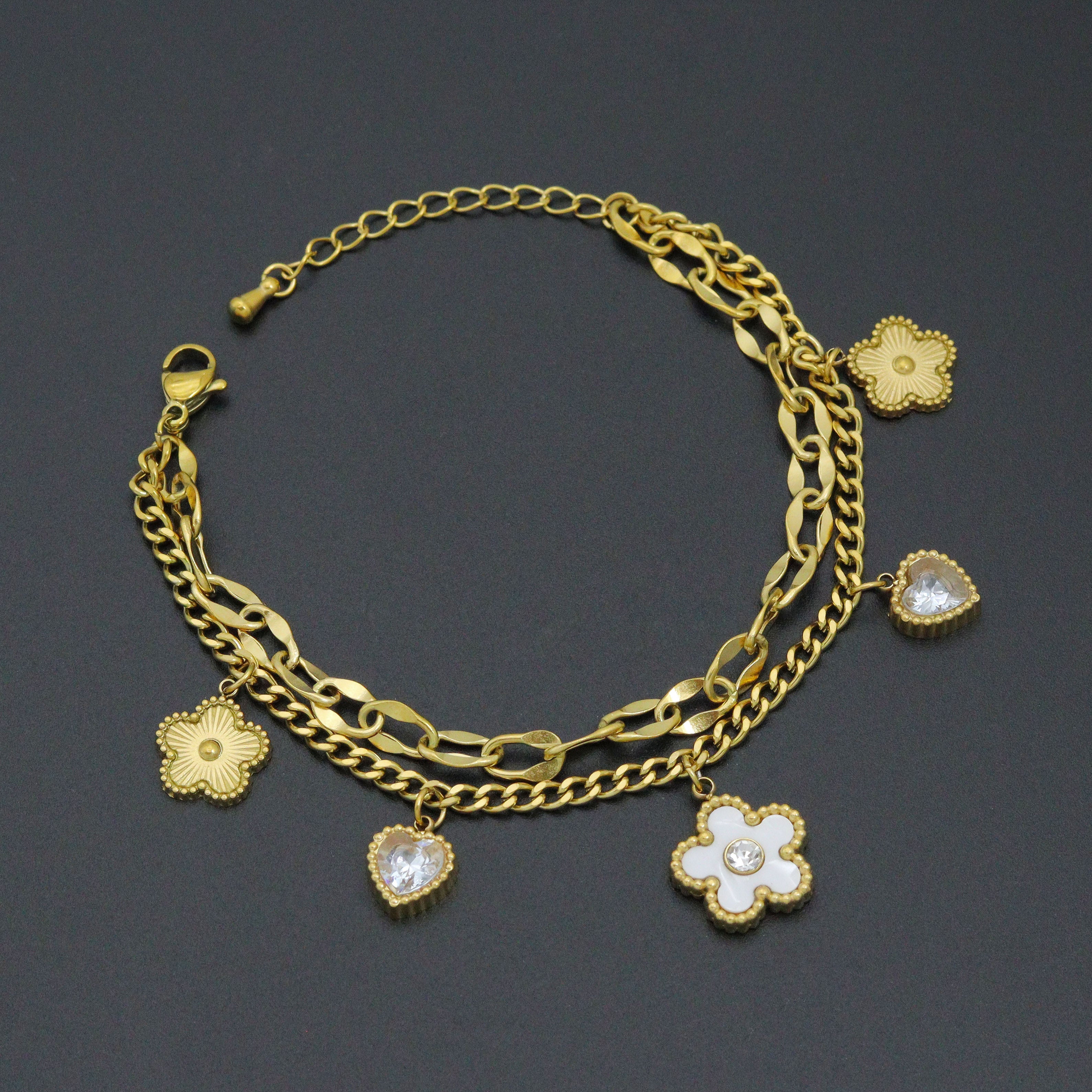 Gold Clover Heart Pendant charm bracelet with double link chain by Bestbeads&Beyond, featuring a heart and clover charms.