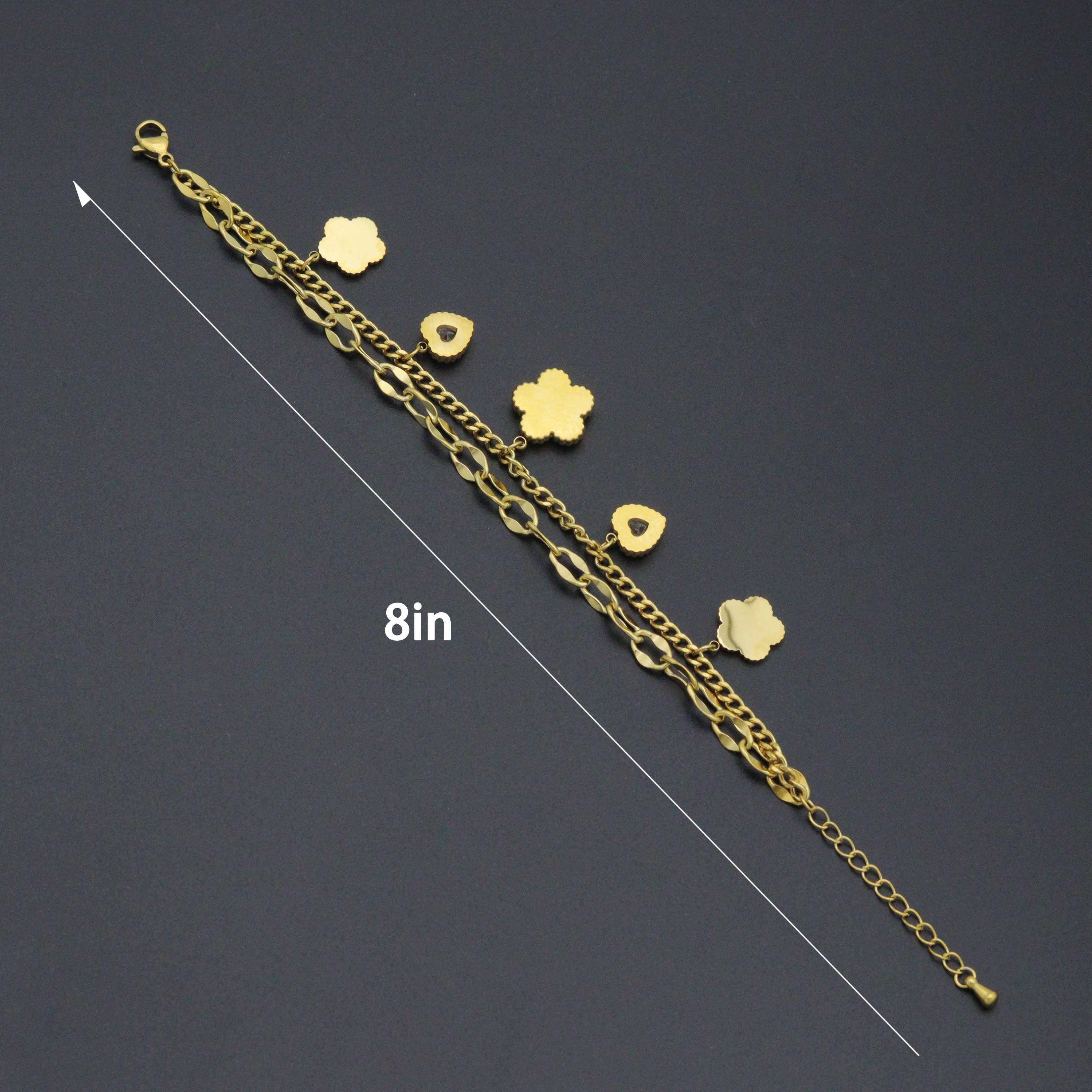 Gold Clover Heart Pendant charm bracelet with double link chain, by Bestbeads&Beyond, featuring a heart and clover charm.