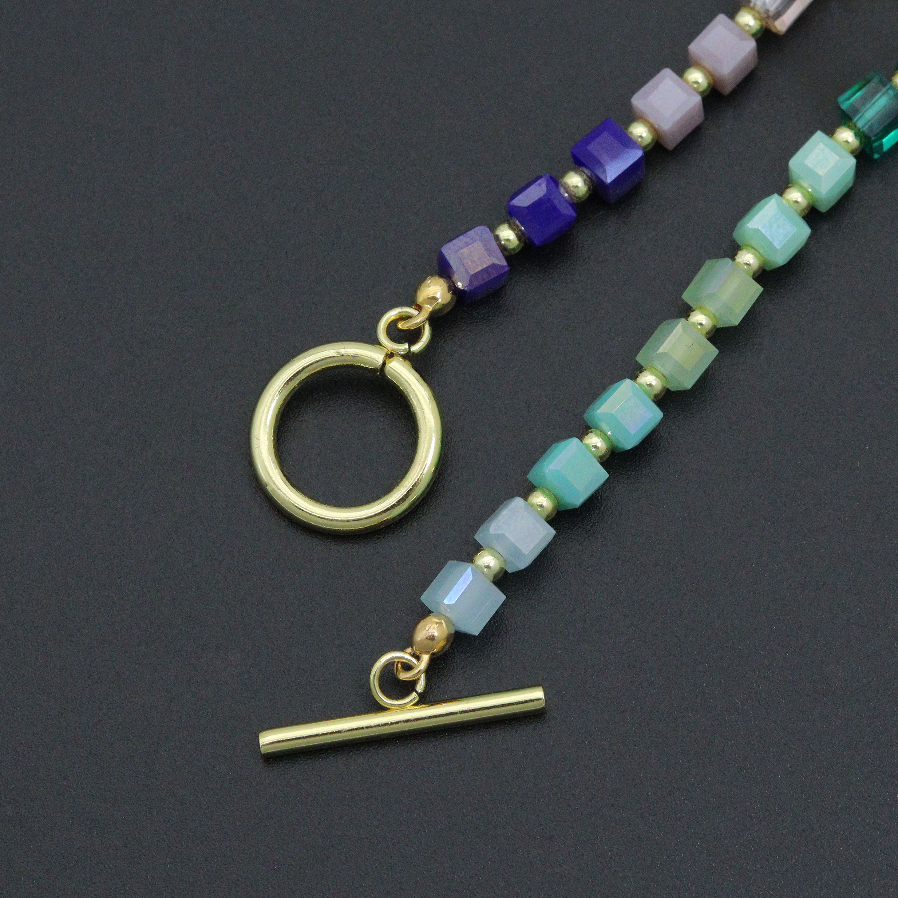Rainbow color cube stone stretchy bracelet with toggle clasp by Bestbeads & Beyond, featuring vibrant cube-shaped beads and secure closure.