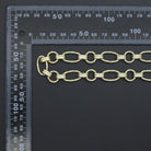 Wholesale chunky round oval link chain by Bestbeads&Beyond, 1 ft, featuring bold metal links for jewelry making or craft projects.
