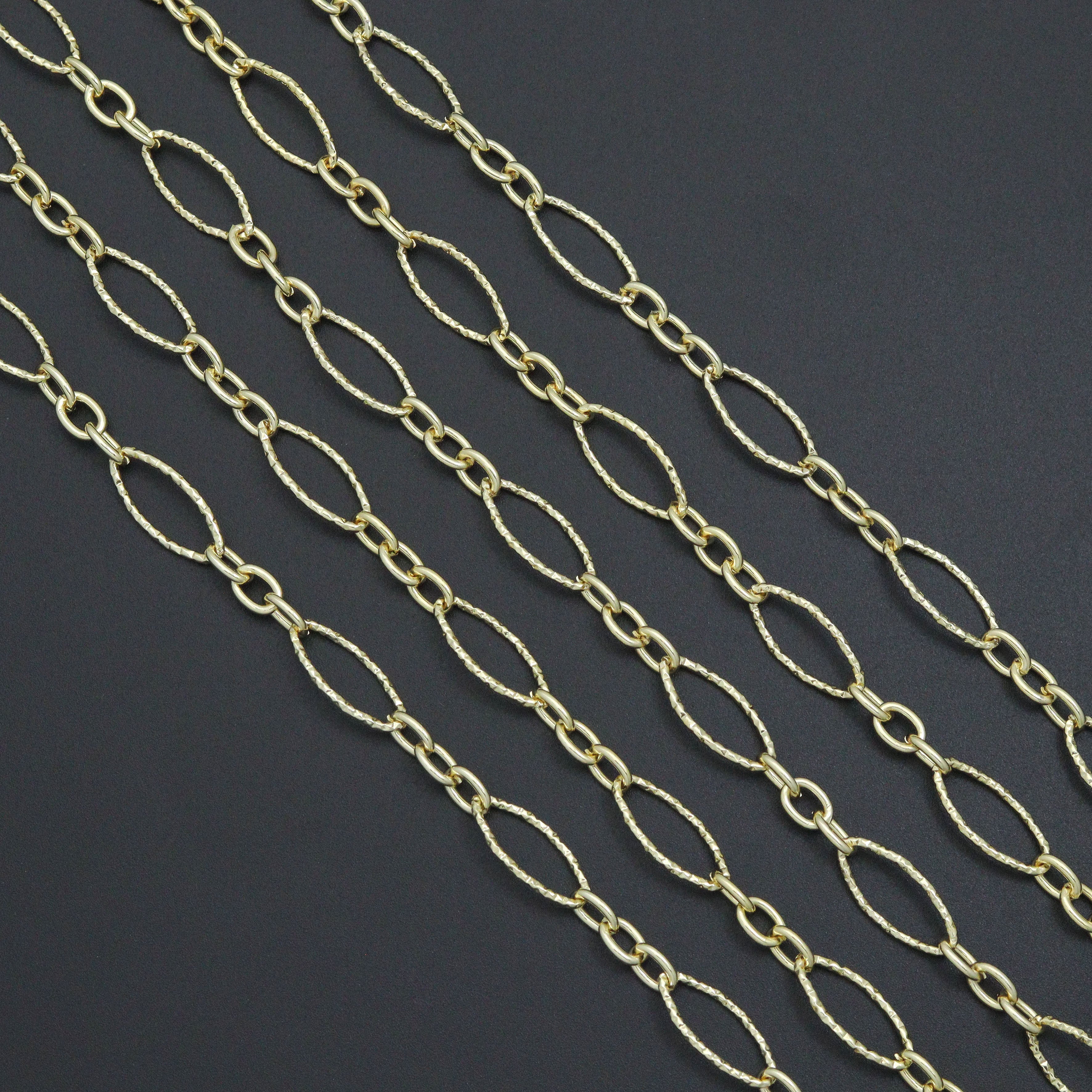 Gold hammered mixed oval shape chain by Bestbeads&Beyond, 1ft wholesale jewelry chain with textured surface and varying oval links.