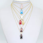Handmade colorful glitter fish charm with evil eye design, crafted by Bestbeads&Beyond, featuring vibrant details and a lucky charm appearance.