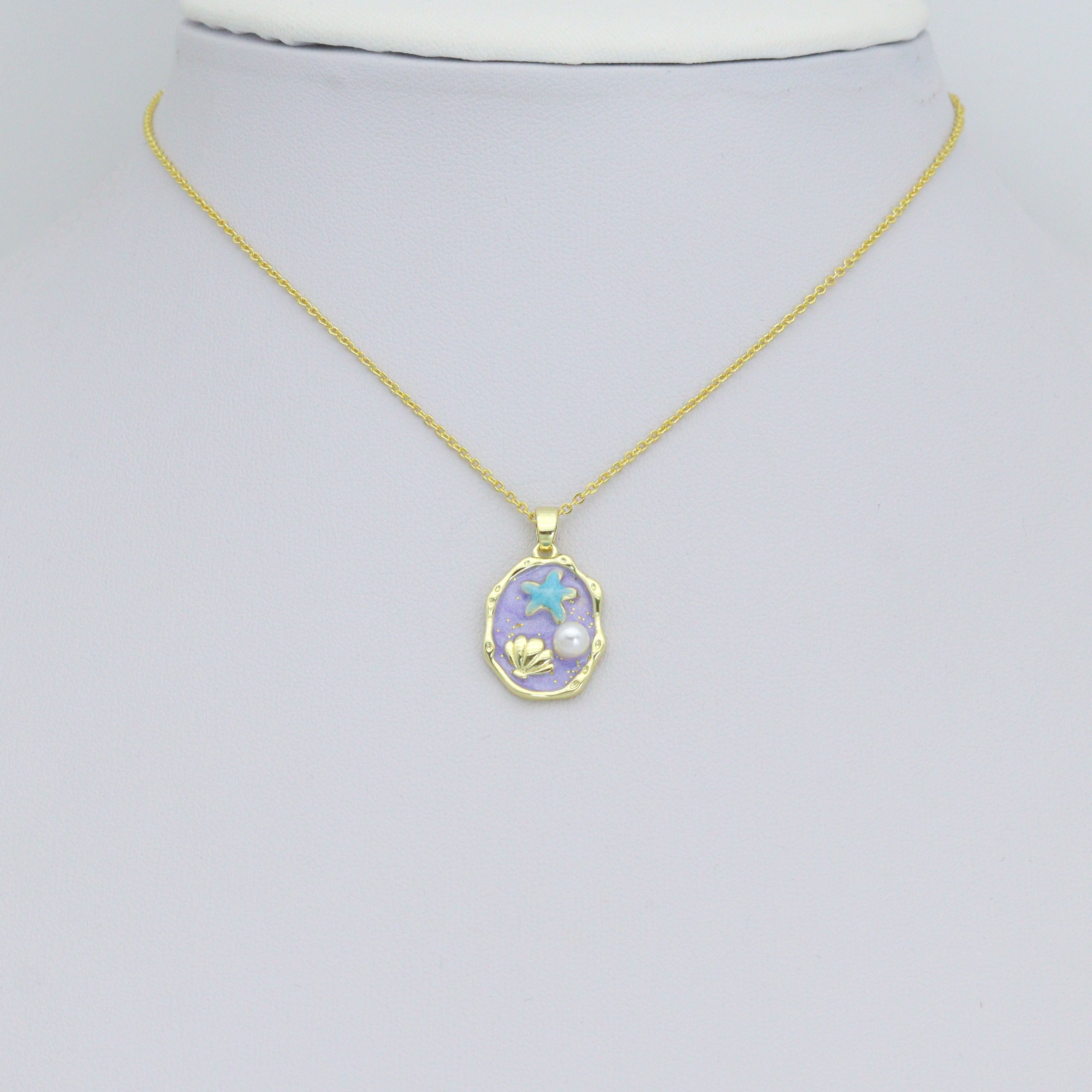 White and purple enamel gold starfish shell pearl oval charm by Bestbeads & Beyond, perfect for jewelry making.