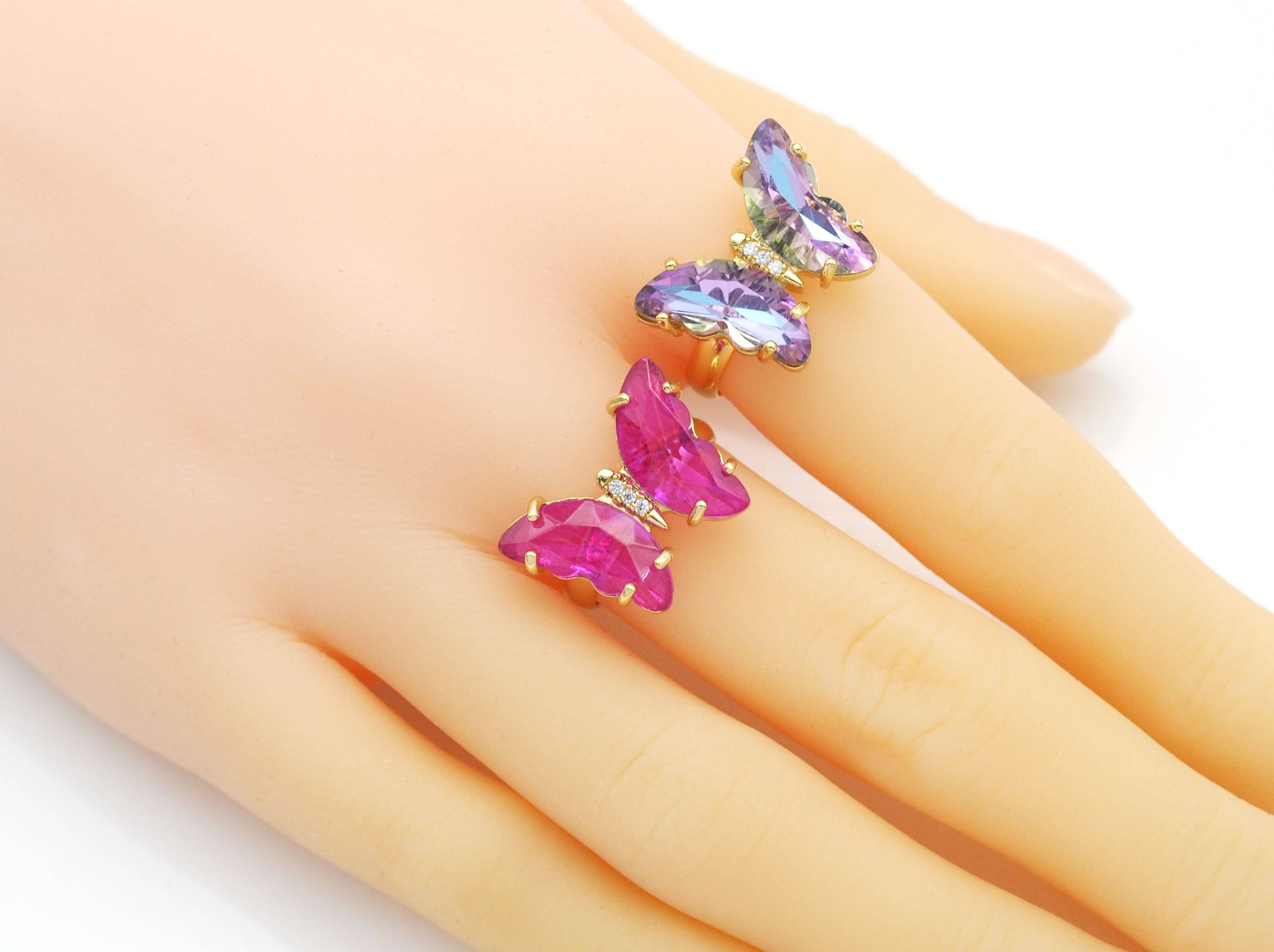 Colorful crystal butterfly adjustable cocktail ring by Bestbeads&Beyond featuring vibrant blue and multicolor crystals.